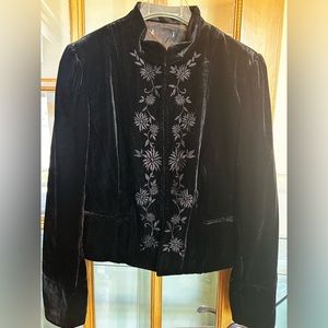 Black velvet jacket in size small with hook and eye closure fully lined